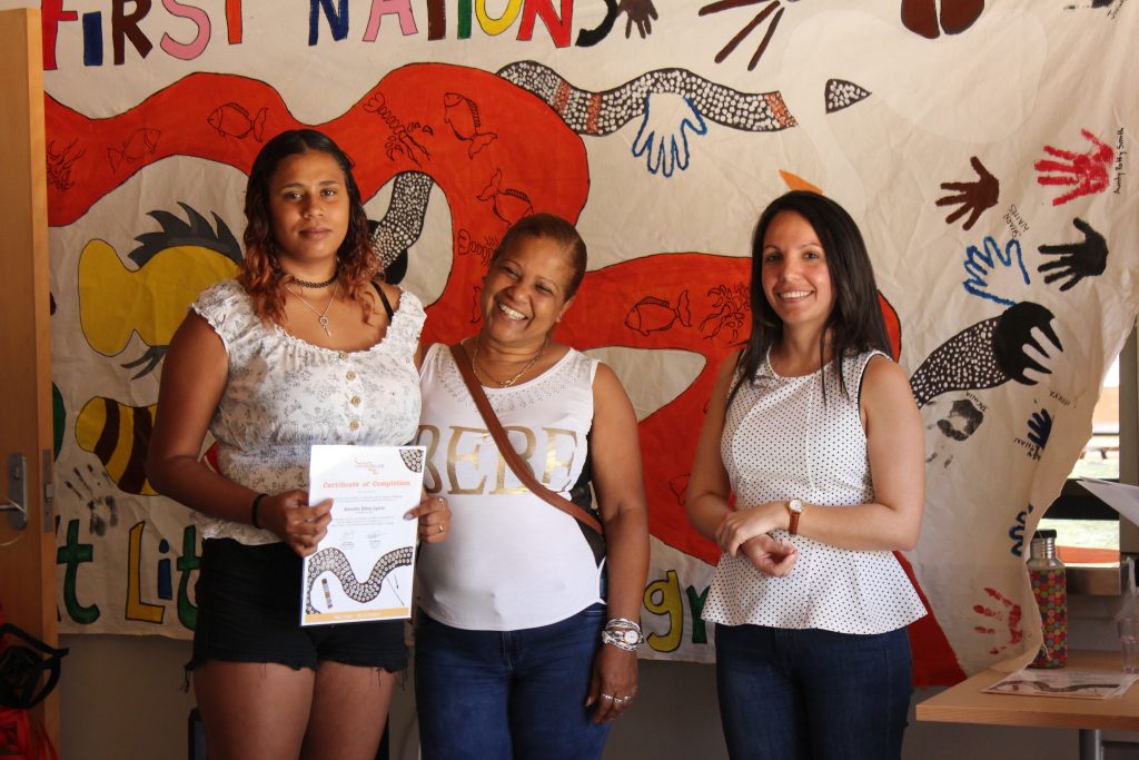 Graduating student Annette Biles-Lyons, Cuban volunteer advisor Lucy Nunez Peraza and Dunia Martin Hernández, Consul, Embassy of Cuba, at the graduation ceremony held in Brewarrina in December 2017. 