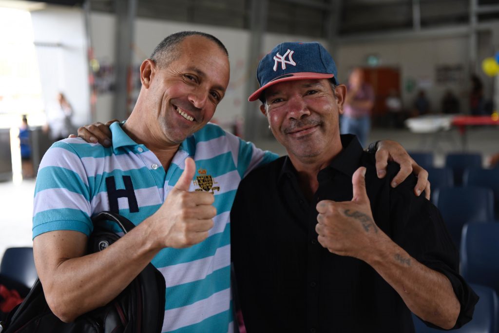 Literacy for Life Foundation's Cuban Advisor Felix Hernandez Diaz and graduate Ronald Edwards at the graduation ceremony held in Toomelah December 2018.