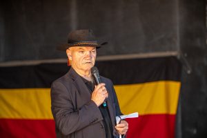 Jack Beetson speaking at a graduation ceremony.